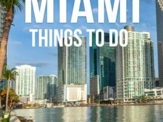 View of skyscrapers with a text overlay: Downtown Miami Things to Do | TravelGeekery.com