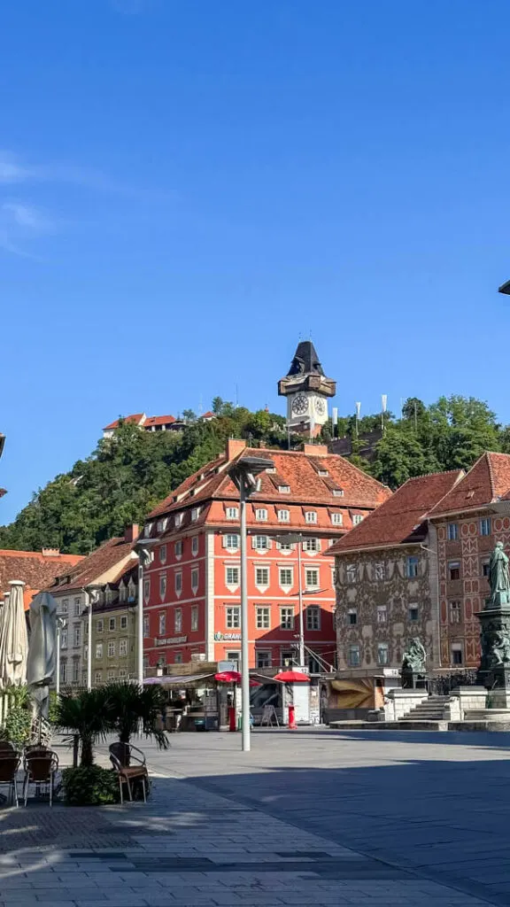 Graz main square with the view of Uhrturm, Graz' famous clock tower