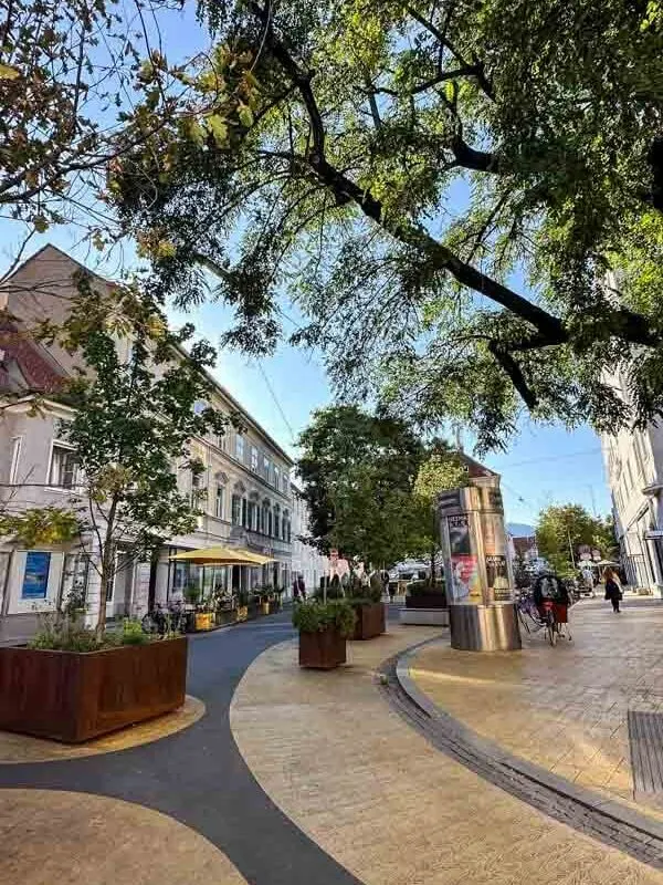 A view of a street with the road painted yellow in Lend district of Graz, Austria