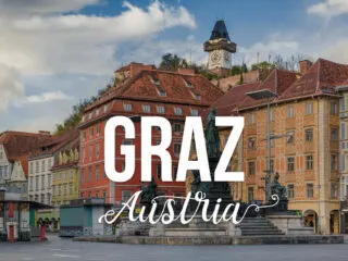 View of a city center with a text overlay: Graz Austria