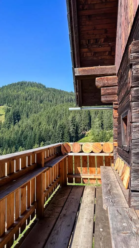 A sunny balcony of a mountain hut in Styrian Alps