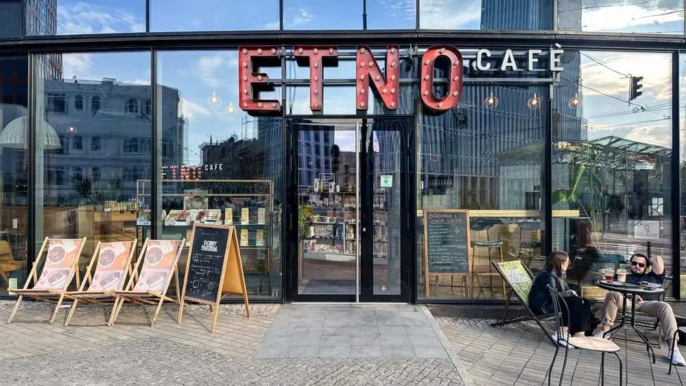 People relaxing in front of Etno Cafe in Lodz, Poland