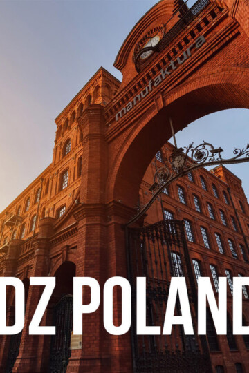 A view of a factory complex with the letters "Lodz Poland" over it