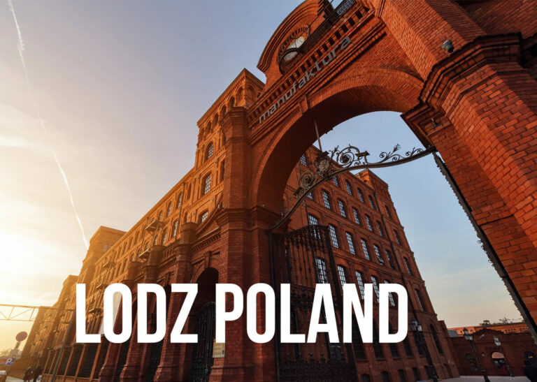 A view of a factory complex with the letters "Lodz Poland" over it