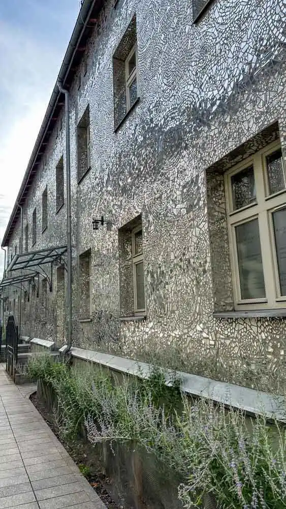 Mirror-covered building as an art project in Lodz Poland